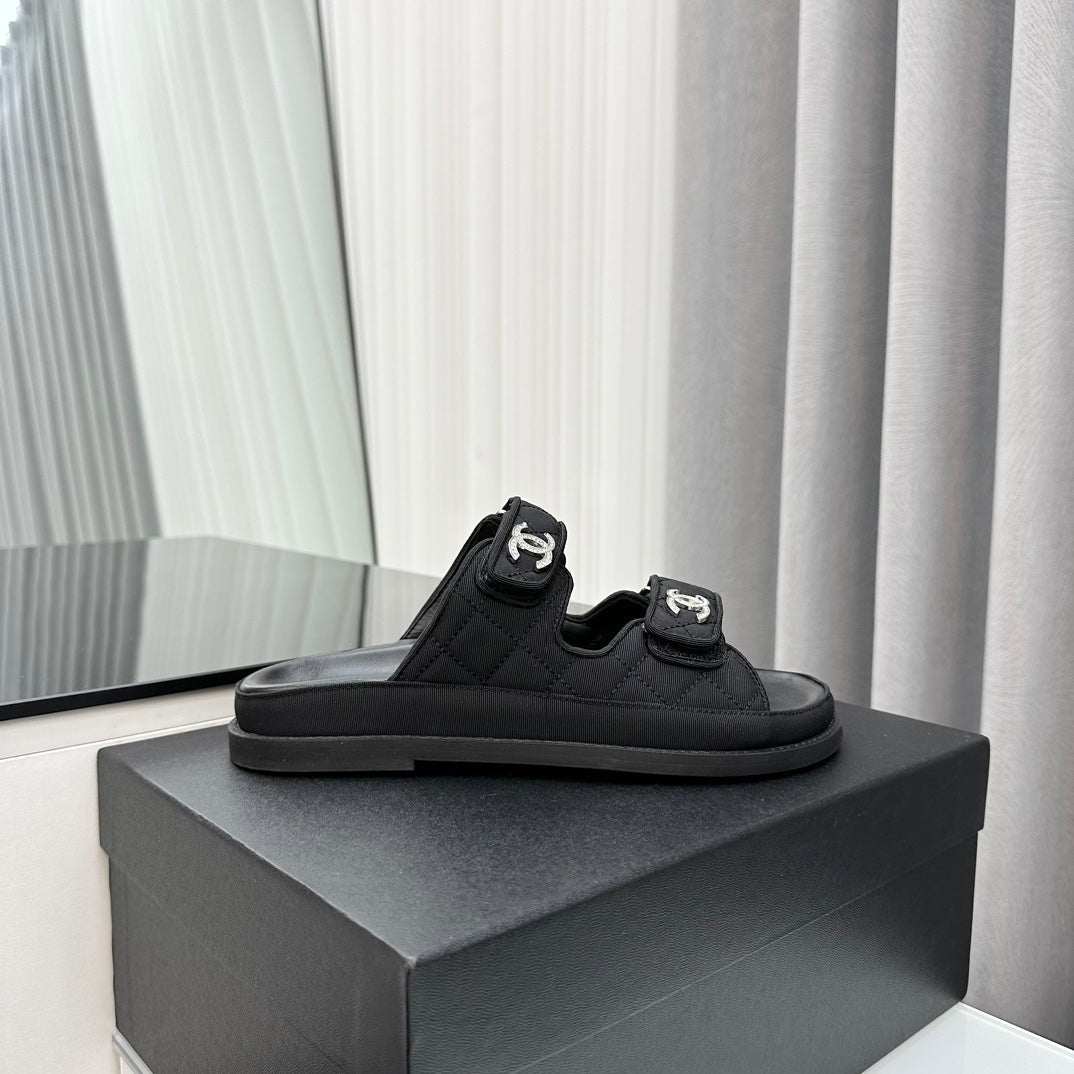 CHANEL dad sandals black textile mules