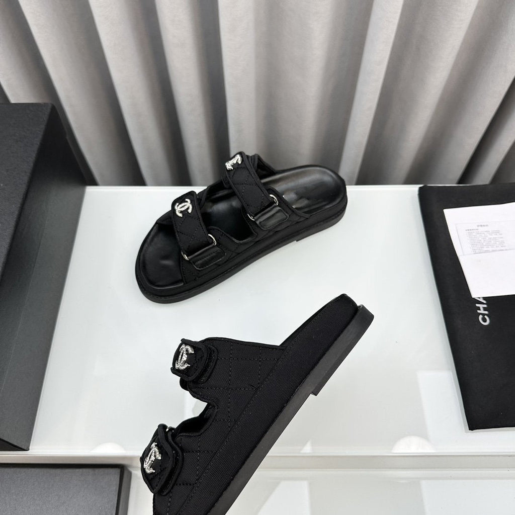 CHANEL dad sandals black textile mules