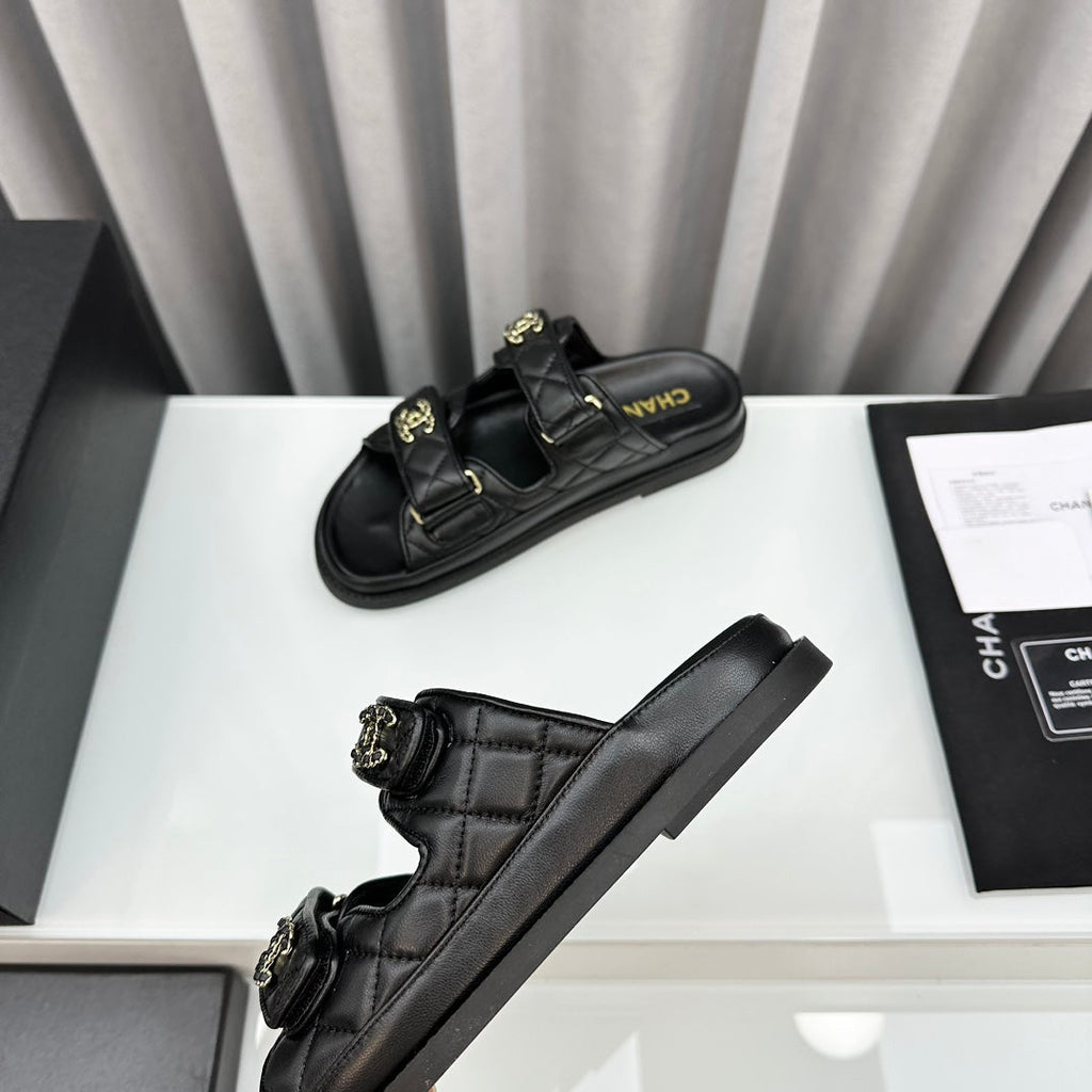 CHANEL dad sandals black lambskin mules