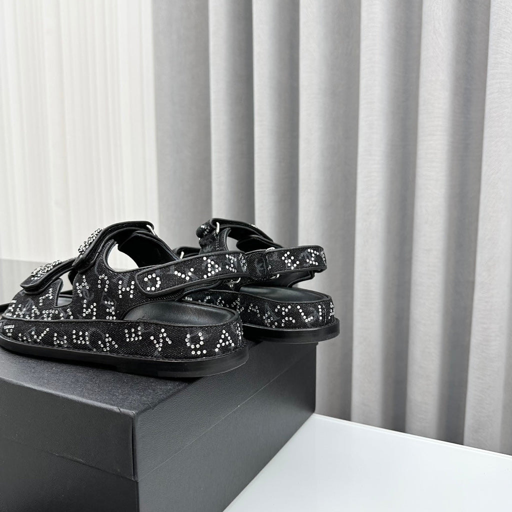 CHANEL dad sandals black denim mules