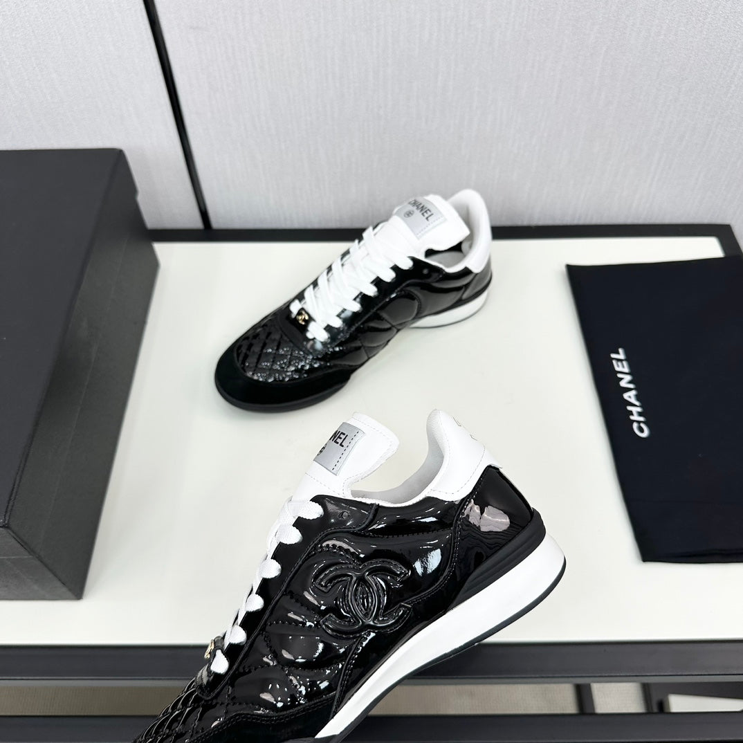 CHANEL SPORTS SHOES IN GLOSSY BLACK CALFSKIN