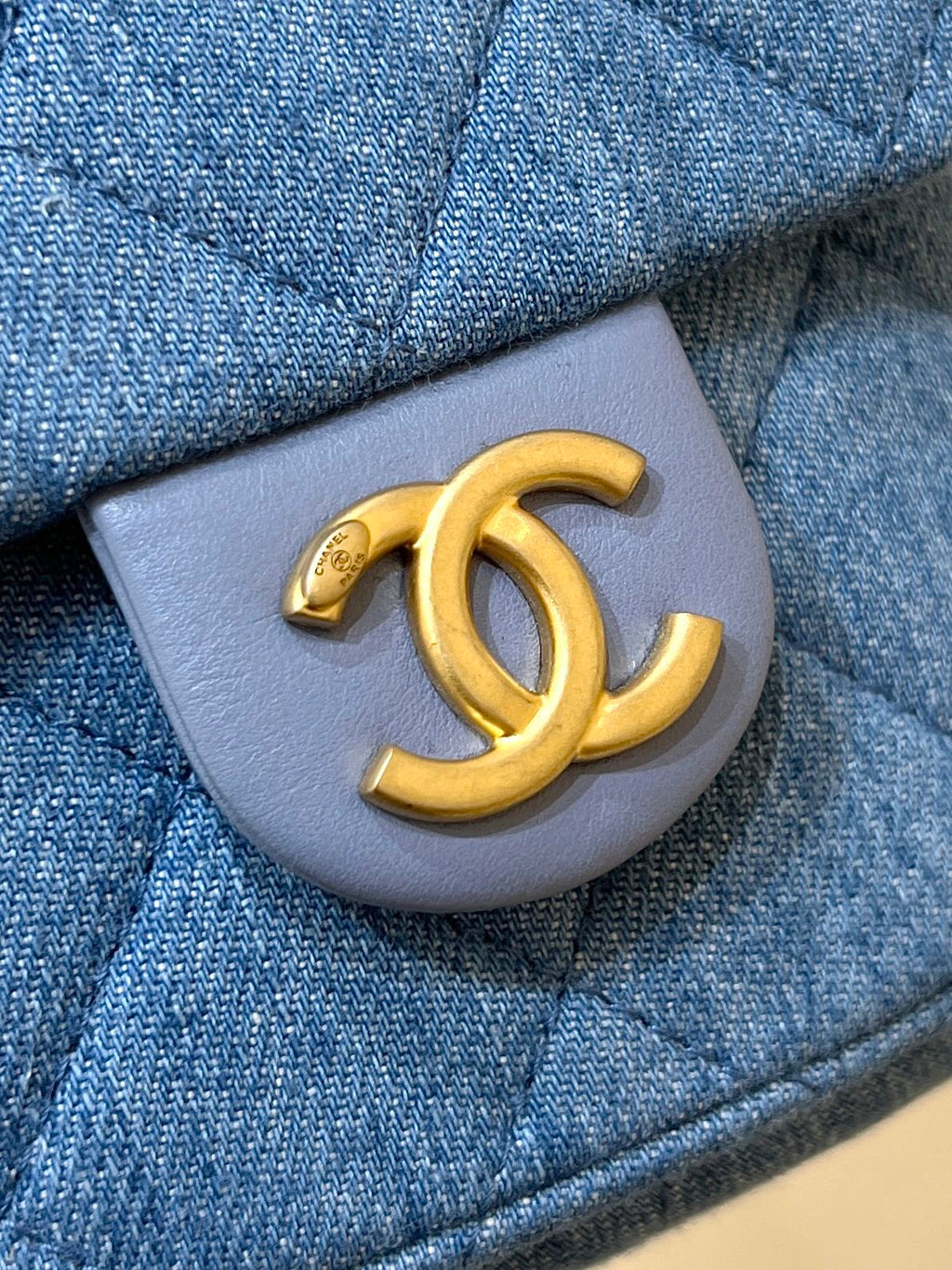 CHANEL DRAWSTRING BUCKET BACKPACK 24 IN MALIBU BLUE DENIM GOLD HARDWARE
