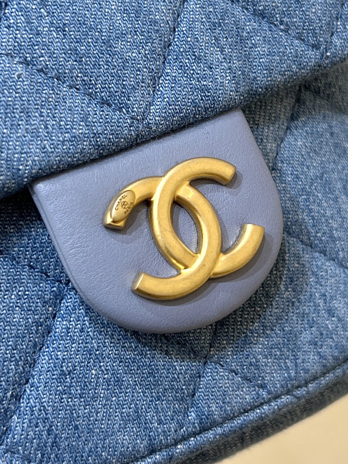 CHANEL DRAWSTRING BUCKET BACKPACK 24 IN MALIBU BLUE DENIM GOLD HARDWARE