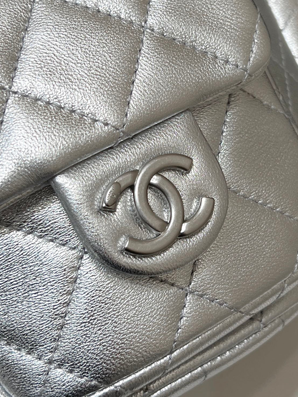 CHANEL DRAWSTRING BUCKET BACKPACK 24 IN SILVER-TONE LAMBSKIN SILVER HARDWARE