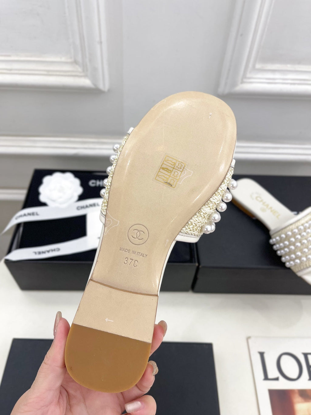 CHANEL FLAT SLIDE IN WHITE CALFSKIN WITH PEARLS