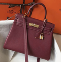 HERMES KELLY 25CM IN BURGUNDY RED CALFSKIN GOLD HARDWARE